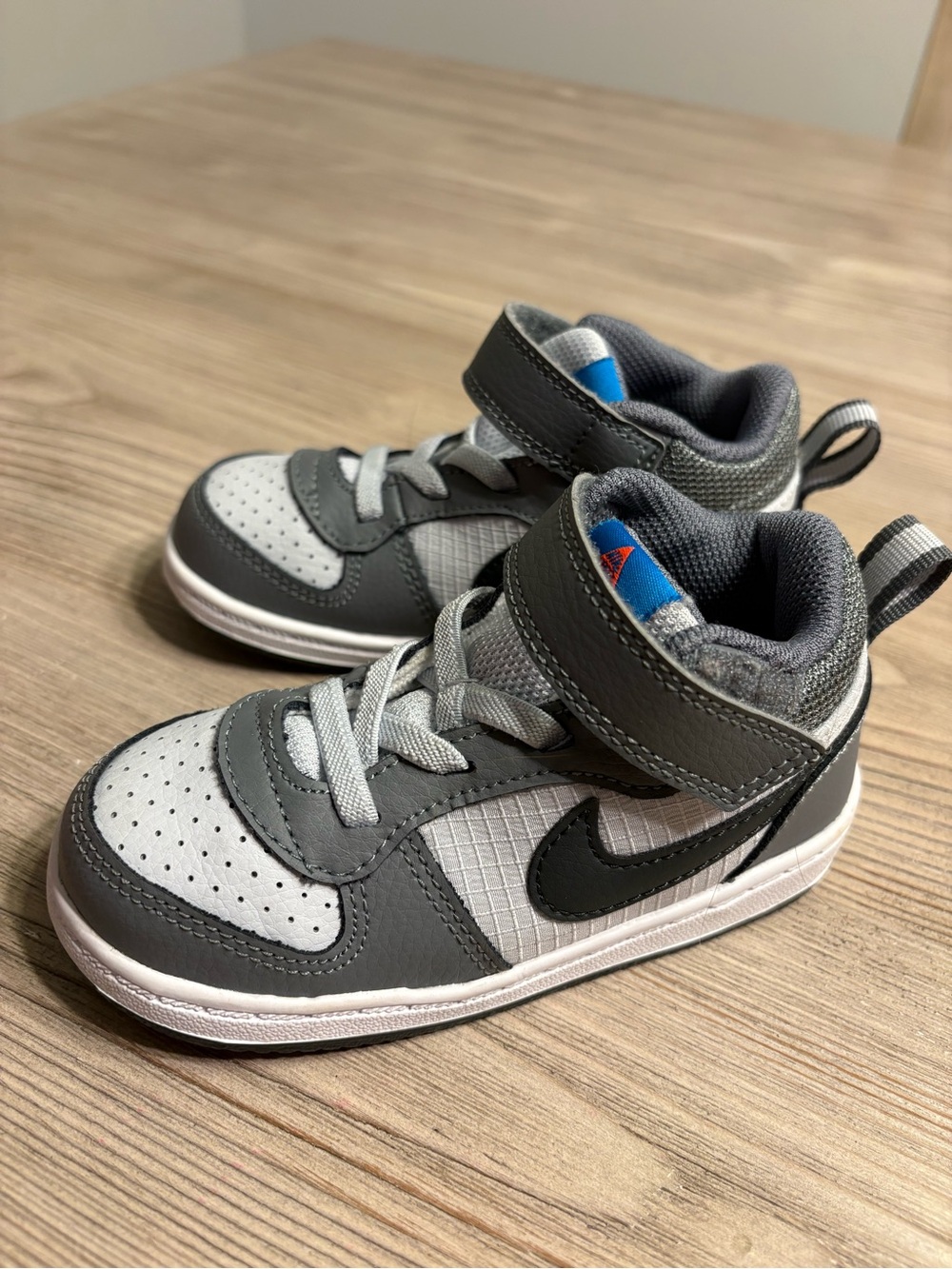 Nike Kids Gray & White High-Top Sneakers with Black Swoosh